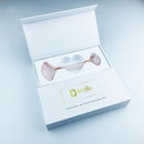 Dsmile rožu kvarca masāžas rullītis sejai iepakojumā